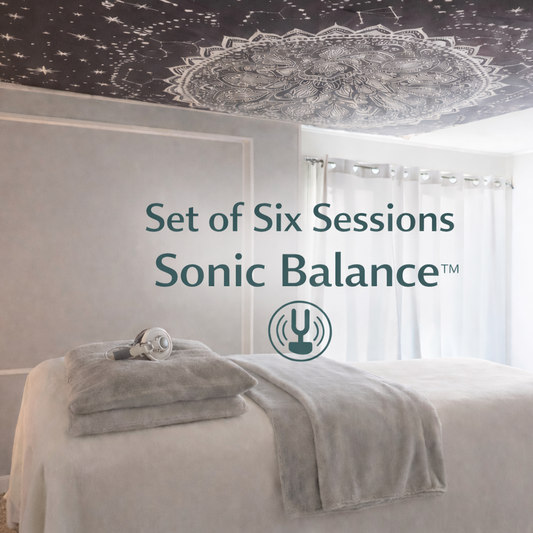 Sonic Balance™ Neuroacoustic Therapy – Set of Six Sessions package displayed in professional treatment room with therapy table and headphones